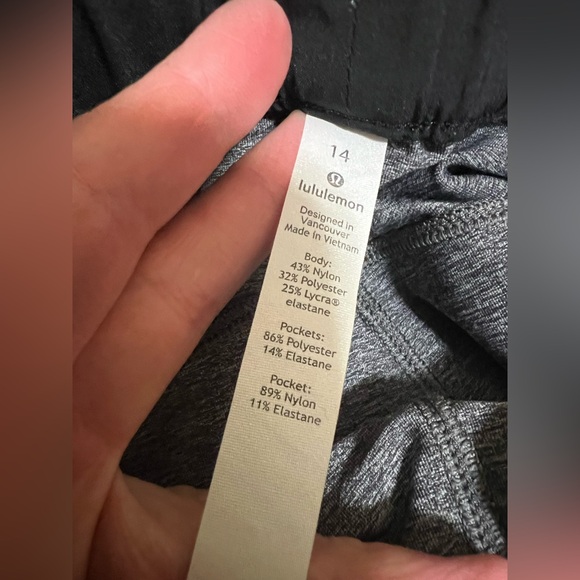 12. Lululemon On The Fly Pant *27" Heathered Black - Picture 14 of 16